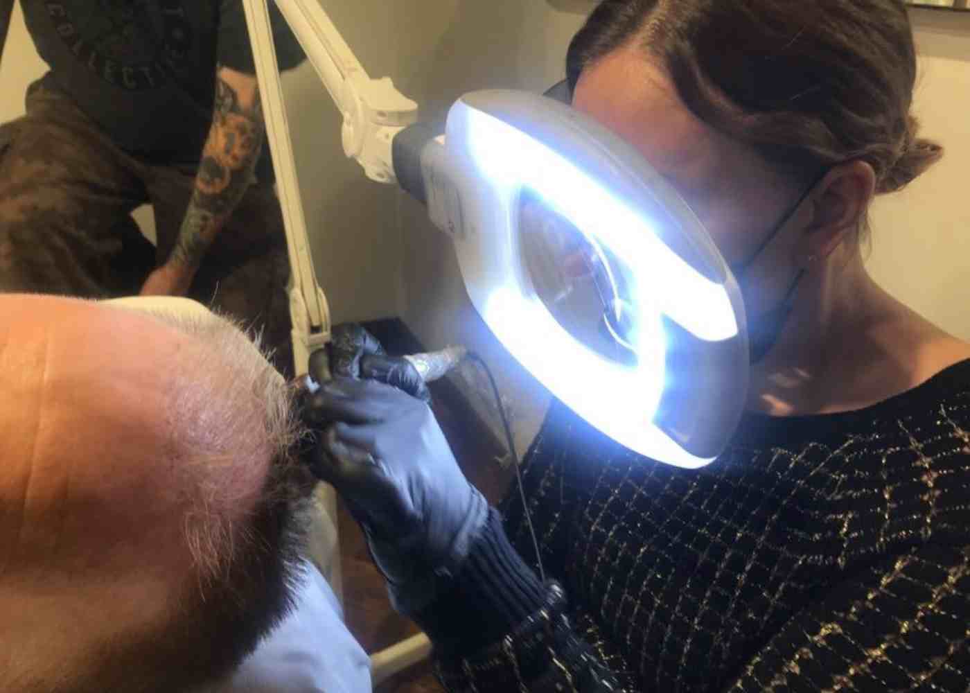 Student completing scalp micropigmentation in-person training course Brisbane